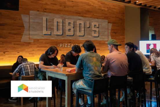Students in Lobo's Pub playing trivia.