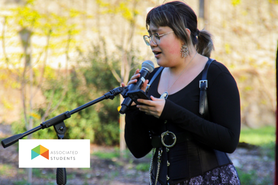 Student singing into a microphone.