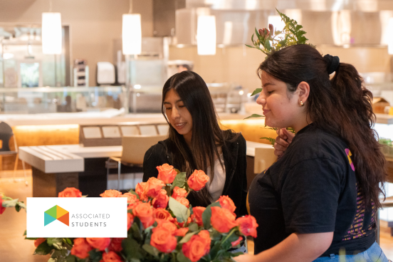 Students gathering flowers to make bouquets.