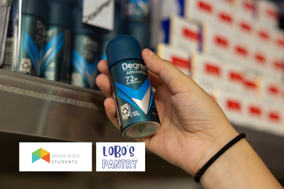 Hand holding out a deodorant. 