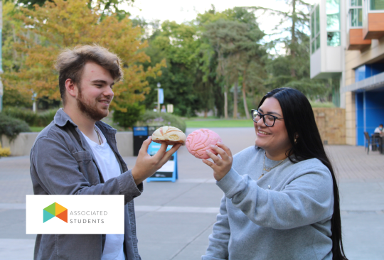 Student cheersing conchas