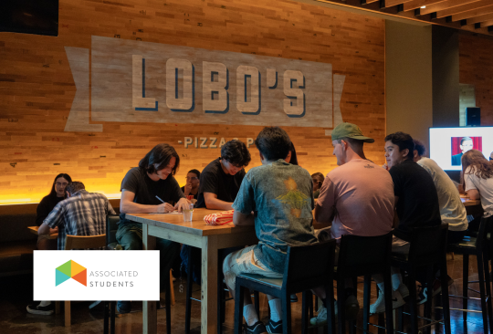 Students in Lobo's Pub playing trivia.