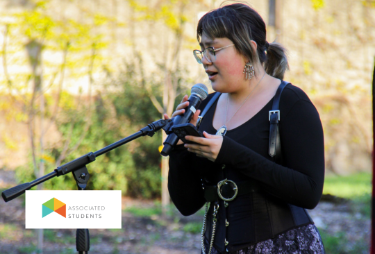 Student singing into a microphone.