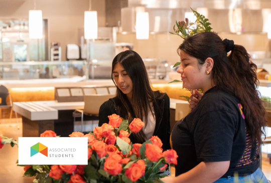 Students gathering flowers to make bouquets.