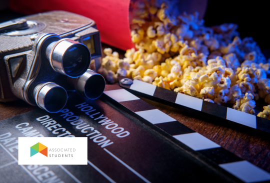 Popcorn and a film clap board.