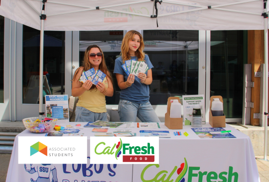 Students tabling at a CalFresh Info table.