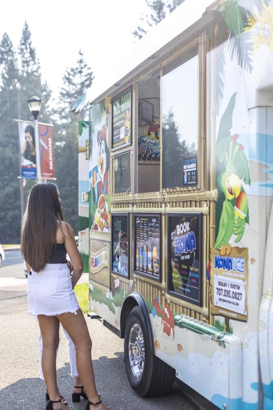 Student ordering from Kona Ice truck