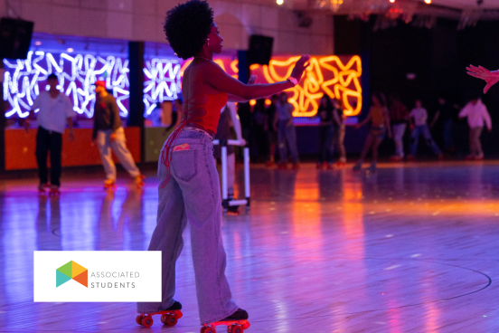 Students roller skating at Cal Skate roller rink.